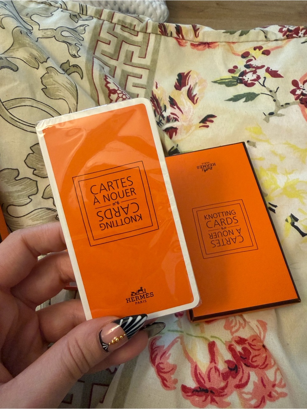 Sealed Hermes knotting cards